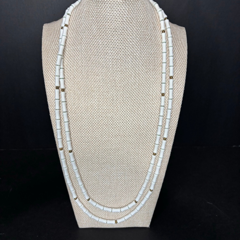 vintage multi-strand white necklace with gold-tone accent